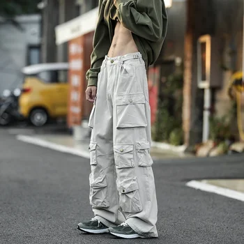 Новые мужские повседневные брюки, Южнокорейские модные штаны для бега трусцой, большие свободные брюки, японские комбинезоны, мужские хип-хоп костюмы с несколькими карманами